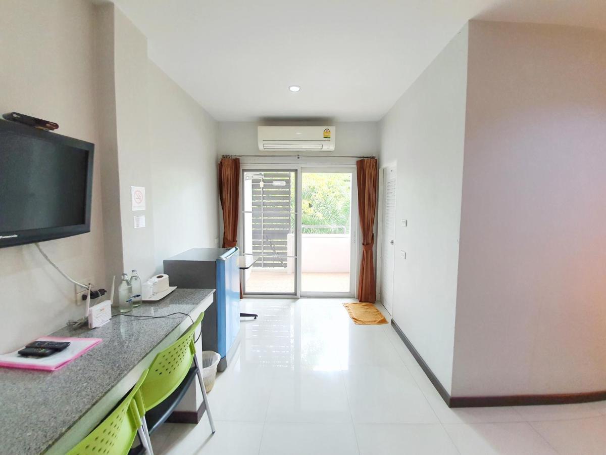 Orchid Surin Apartment Exterior photo